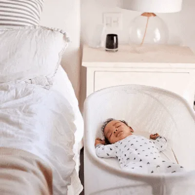 How to get a newborn to sleep without being held