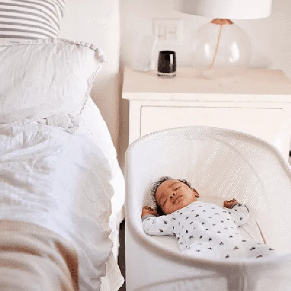 How to get a newborn to sleep without being held