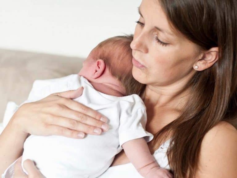 Why Your Baby Spits Up When Laid Down And 8 Tips to Help