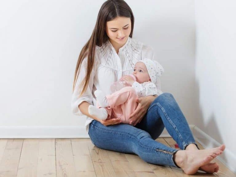 Why Your Baby Spits Up When Laid Down And 8 Tips to Help